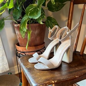 Grey ankle strap heels with a thick heel